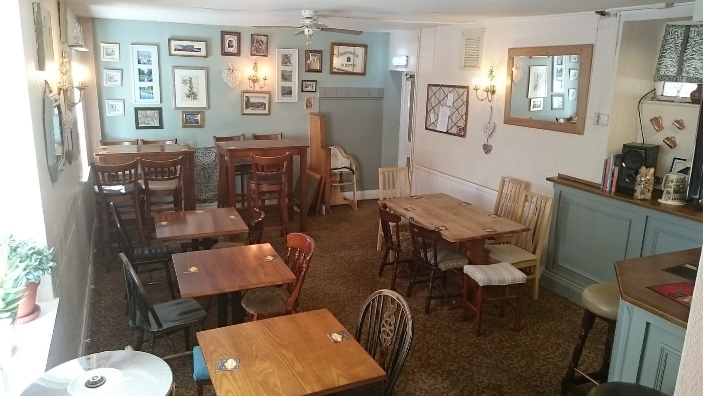 The dining room with wooden tables