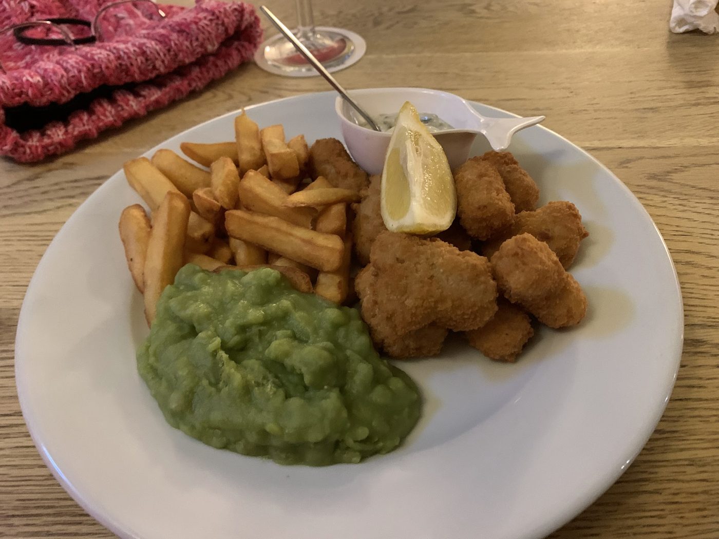 Scampi and chips with mushy peas and lemon